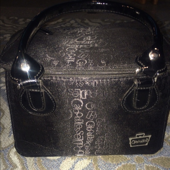 A slick black make up bag