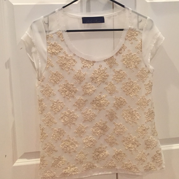 White sheer top with gold design