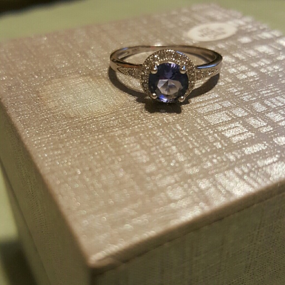 A bluish purple ring size 7
