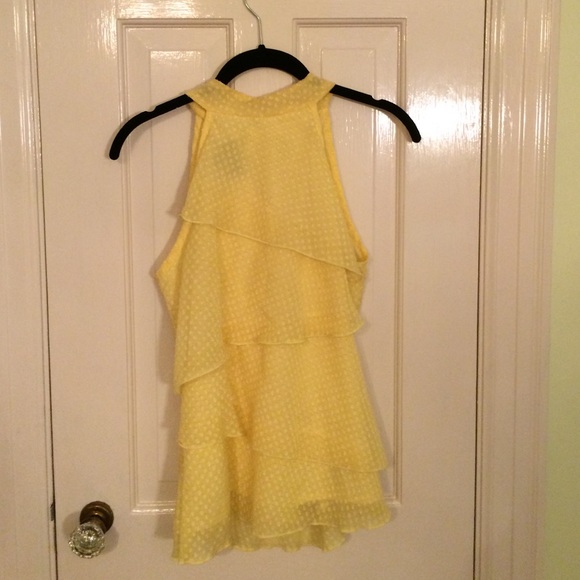 Yellow ruffled blouse