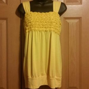 Pretty in yellow sleeveless top
