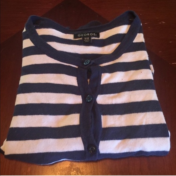 Tweens carry. Navy blue w/stripes.