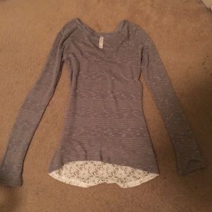 Grey top with lace.