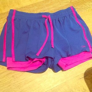 Blue athletic shorts with spandex