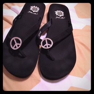 Yellow box peace sign flip flops