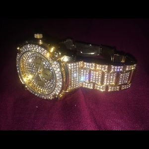 Gold diamond watch.