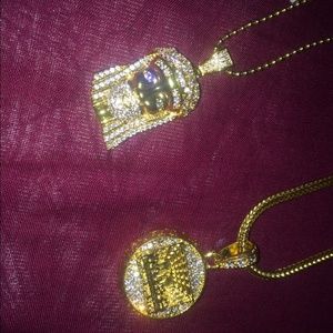 Two gold diamond necklaces.
