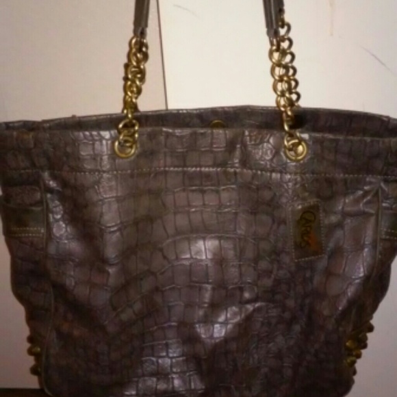 Carlos santana purse