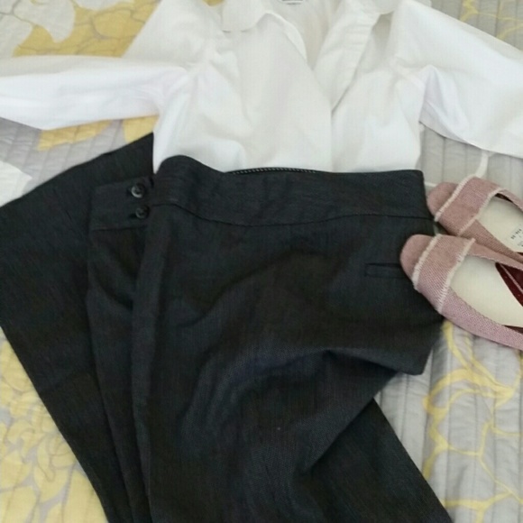 Black slacks with small white polka dots