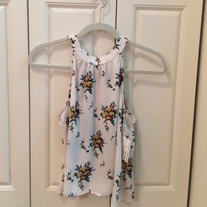 NWT. Lush high neck floral blouse with open back