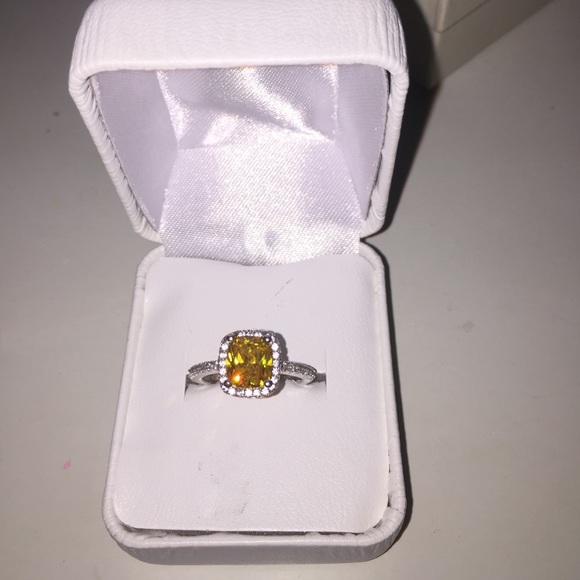 Simulated cushion cut canary yellow ring!
