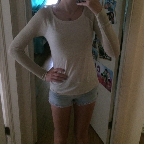 Neutral with gold sleeved shirt