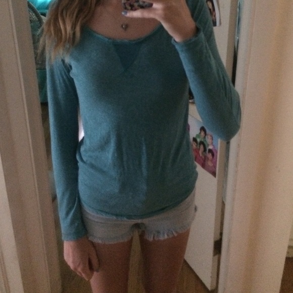 Blue long sleeve tee.
