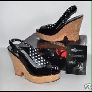 **SOLD**Fergalicious black patent cork wedge