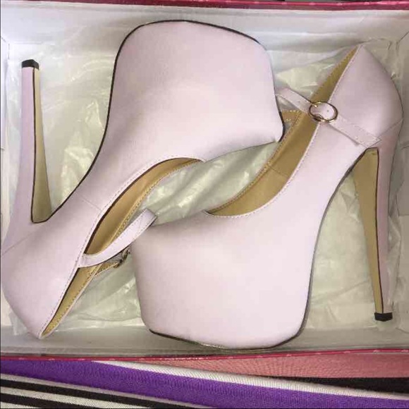 Mary Jane platform pumps.