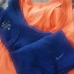 2 Nike tanks