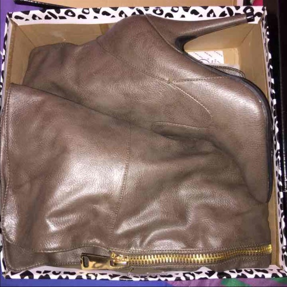 Anne Michelle over the knee pointed-toe boots.