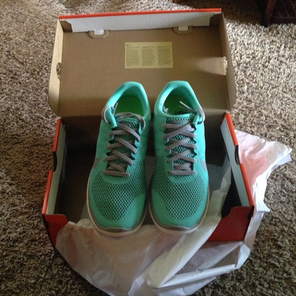 Nike Shoes - Tiffany blue nike free 4.0, size 8, never worn.