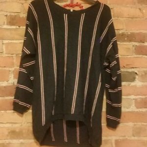 Navy sweater with red and white stripes
