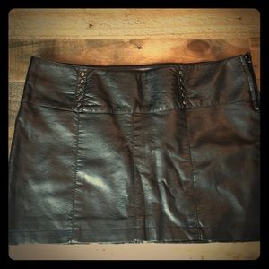 Faux leather mini skirt + reversible fur vest.