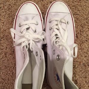 White high top converse.