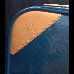 Authentic Louis Vuitton Rolling Suitcase.