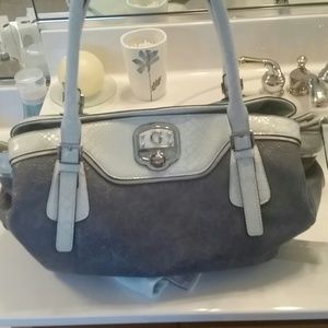Guess purse decent size lots of room and compartme