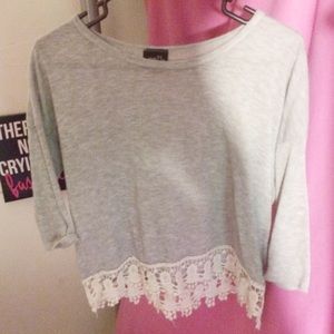 grey crop top w/ crochet on the bottom.
