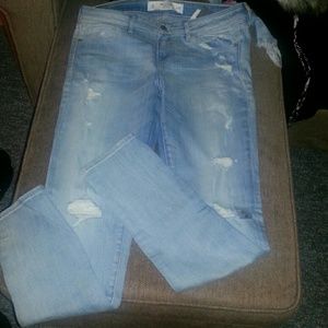 Light blue ripped jeans