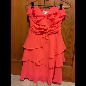 Coral ruffle cocktail dress