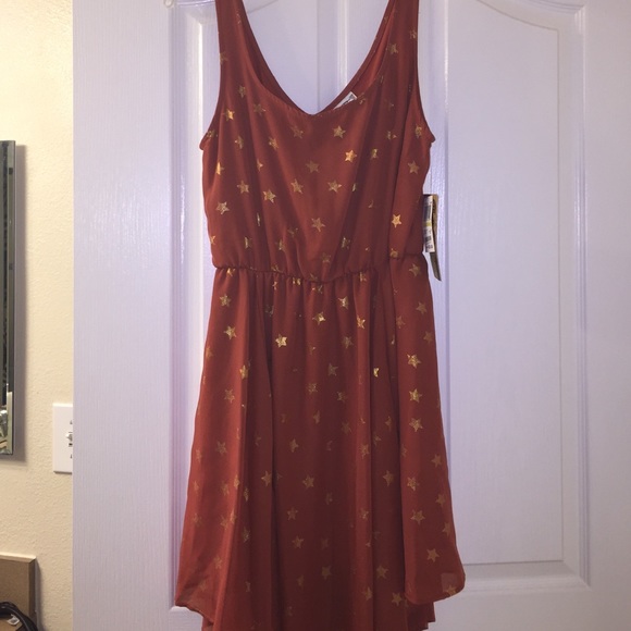 Orange dress with gold stars