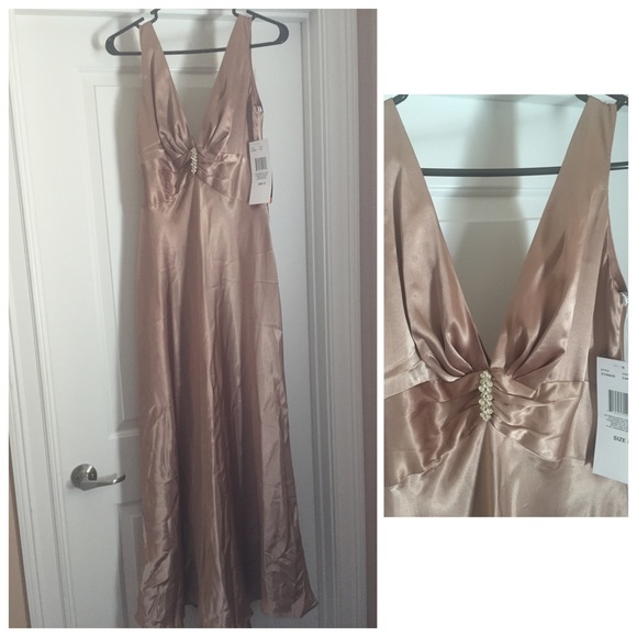 Floor length gown with mini train in the back