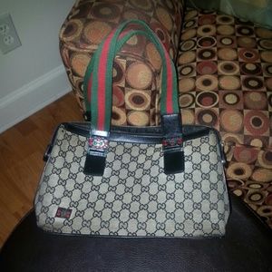 Rare monogrammed gray canvas handbag.