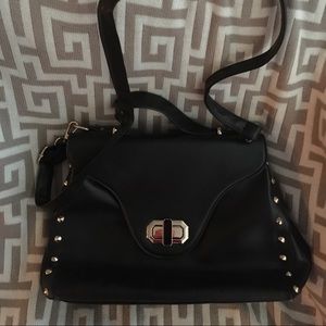 Black studded handbag