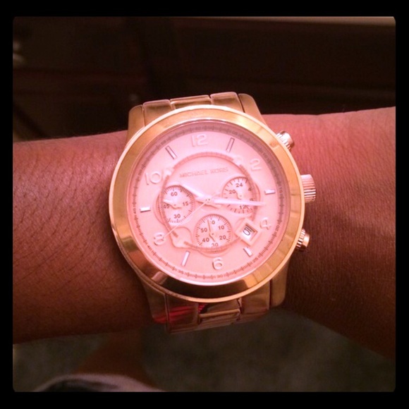 Michael kors gold tone oversized watch.