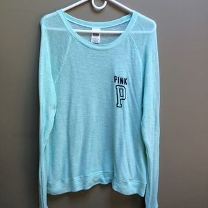 light blue/green sweater