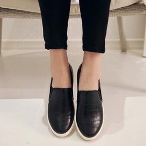 Black Steve Madden Slip Ons