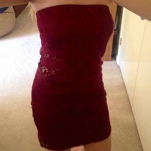 Burgundy lace dress with lace cutouts