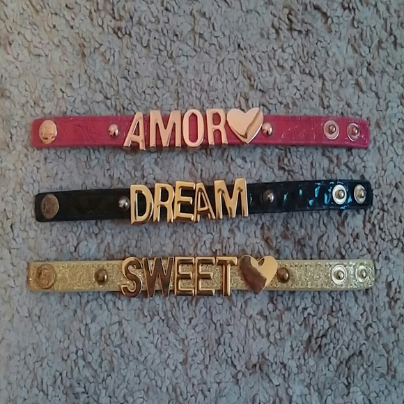 3 bracelets with the words Amor, dream and sweet.