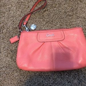 Coral coach wristlet