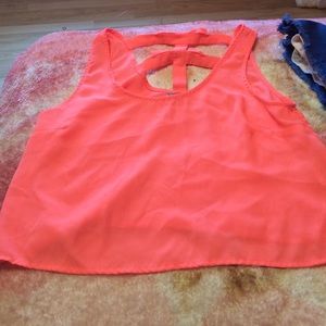 An orange tank top