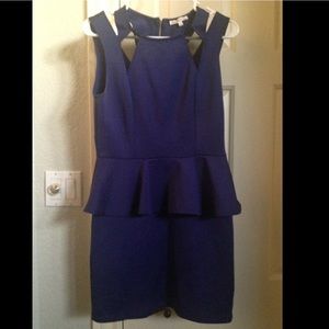Blue peplum dress with mesh cutouts