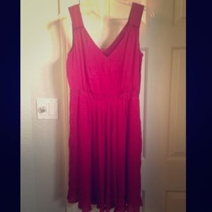 Flowy red satin pleat dress