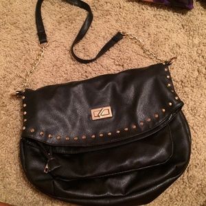 Black/gold crossbody bag.