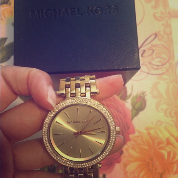 Michael Kors-- gold link watch w/diamond face.