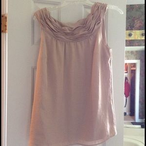 Gold sleeveless blouse