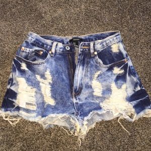 Acid wash ripped high waisted shorts