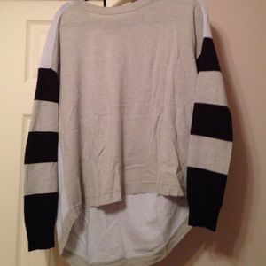 Color blocked sweater with striped sleeves