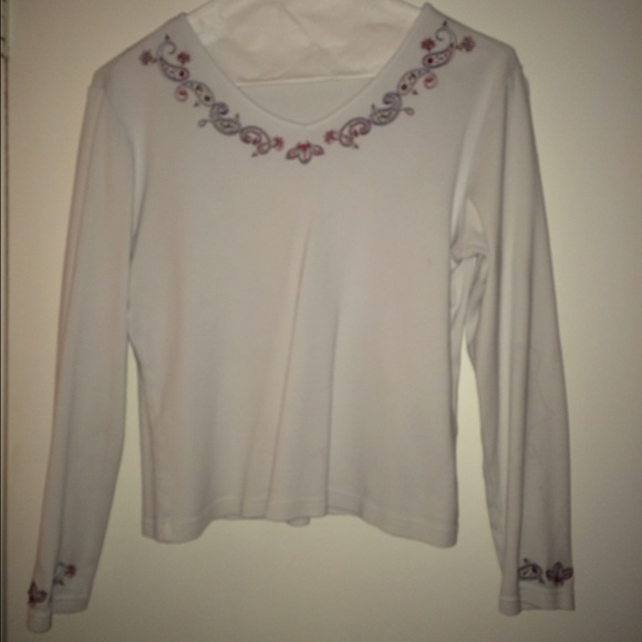 white long sleeved top with design
