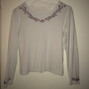 white long sleeved top with design